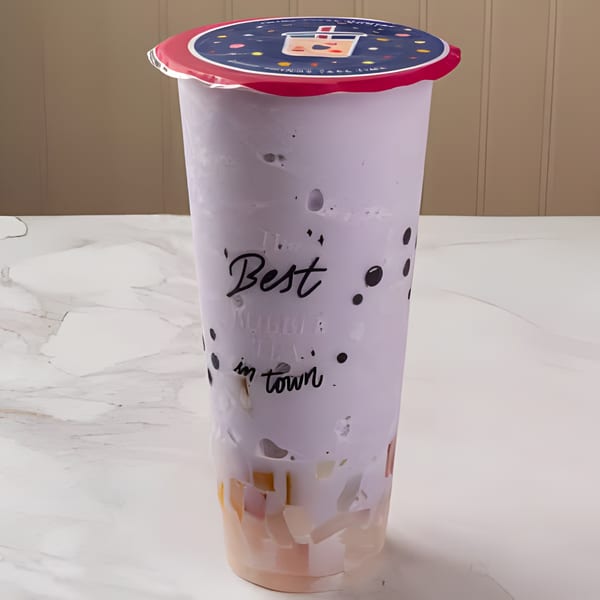 A C Deli's taro bubble tea with colorful jellies and a "Best in town" label.