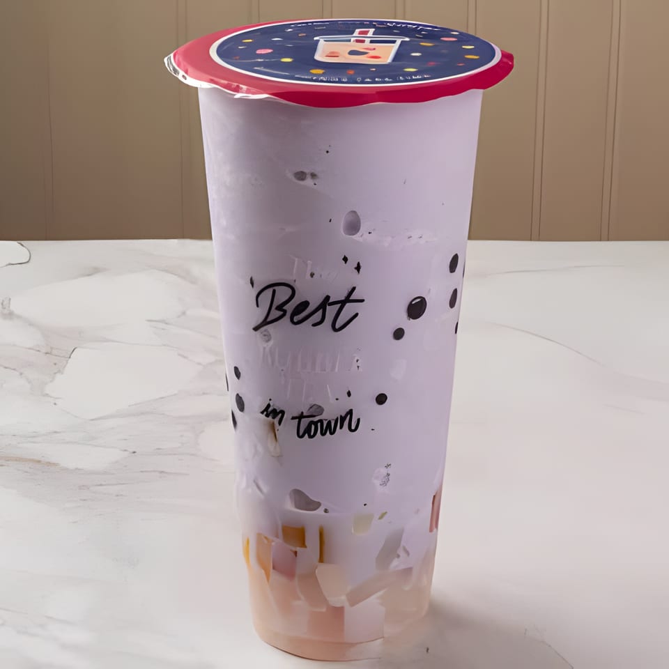 A C Deli's taro bubble tea with colorful jellies and a "Best in town" label.